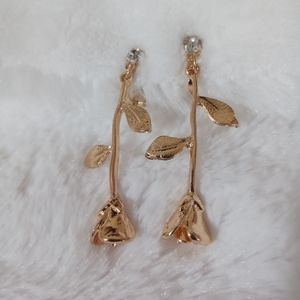 Golden rose clip on earrings